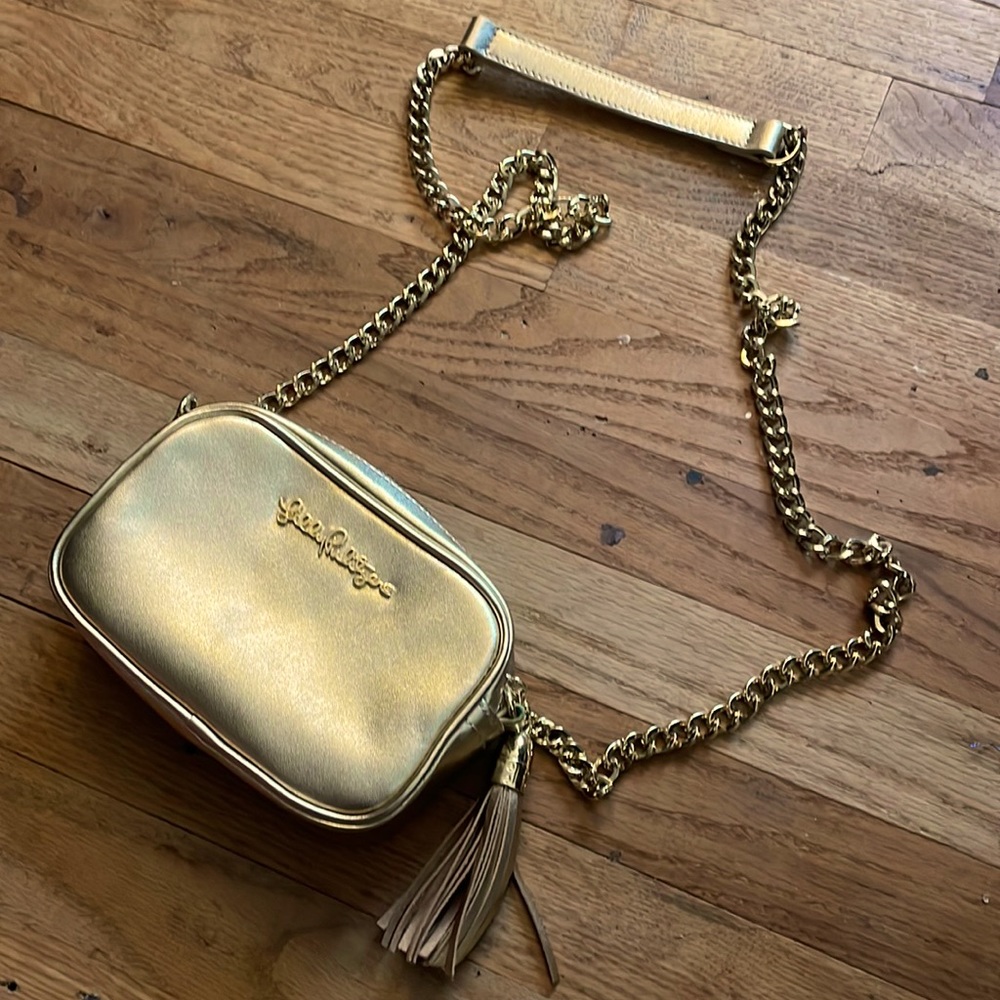 Lilly Pulitzer gold leather crossbody bag with tassel detail Amd chain strap